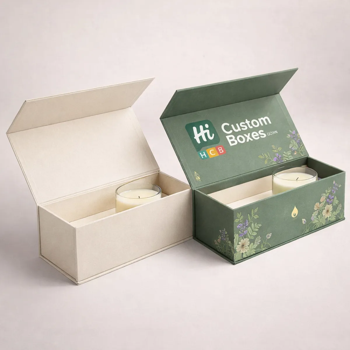 Premium rectangular magnetic lid boxes in cream and sage green, holding minimalist glass jar candles. class=